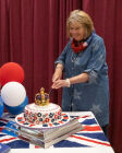 Our President - Lindsay Entwistle cutting the cake.