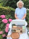 Marjorie with the first and last items of craft work made whilst attending Denham.